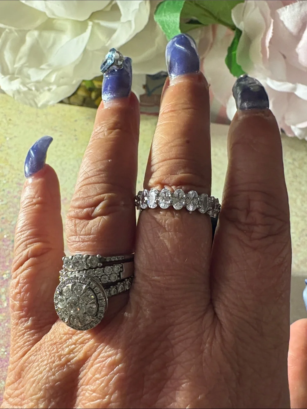 Classic Rhodium Cubic Zirconia Halo Eternity Band oval cut.